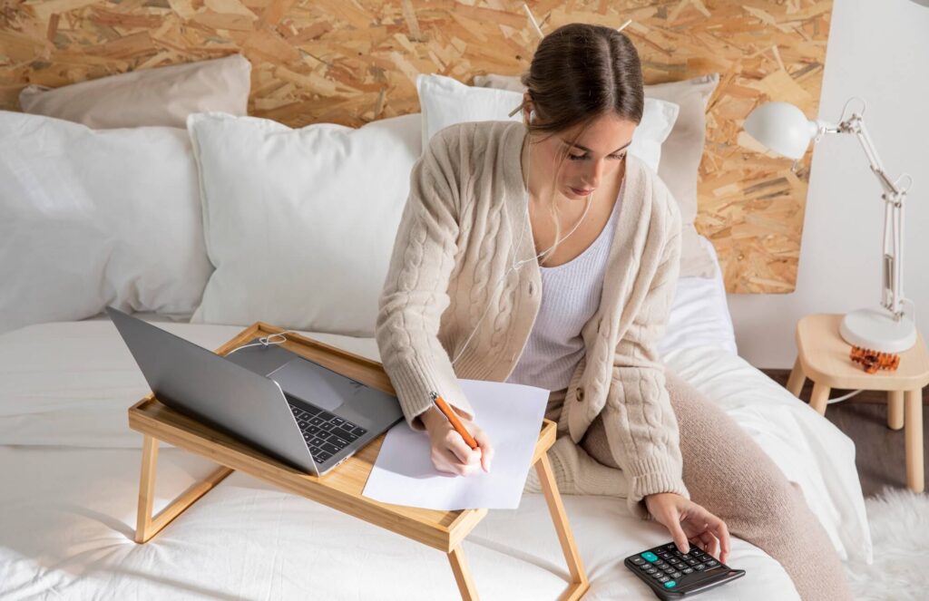 medium shot freelancer with calculator